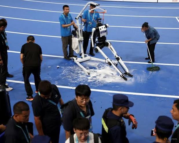 At China's 'robot Olympics', humanoids spar, sprint and perform taichi - CNA