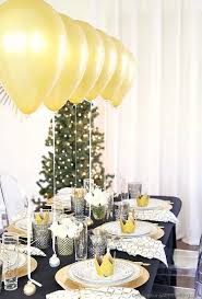 The dinner plate is positioned in the center of the place setting and everything else is placed around it. 26 Festive And Glamorous Party Table Settings For New Year S Eve