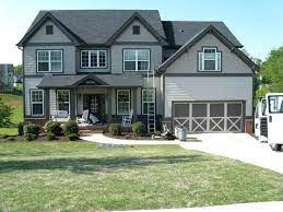 As a trim color, it can accent white or neutral gray exteriors. Gray House With Black Trim Grey House Paint Engaging Laundry Room Decor Ideas New In Grey Ho Gray House Exterior Outdoor House Paint Outside House Paint Colors