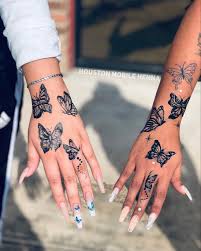 Pin By Morsha Lewis On Tat In 2020 Butterfly Hand Tattoo Hand Tattoos Cute Tattoos