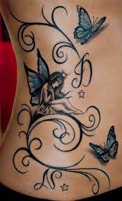 Fairy And Butterflies Pixie Tattoo Pretty Tattoos Tattoos