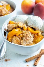 Combine the peaches, 1 cup sugar, and water in a saucepan and mix well. Southern Peach Cobbler Buttery Flaky Topping Evolving Table Recipe