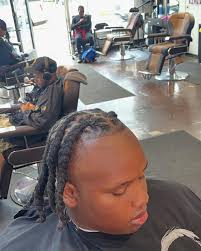 Proud of my boy Calvin met him 2 years ago barbershop talk he was a lil  rough but he listened and changed his behavior and now look at him  Graduating with honors