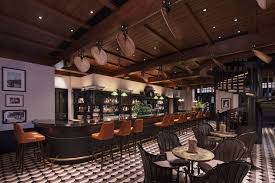 Bathroom speaker, mini bar, nespresso coffee machine . Long Bar Raffles Singapore Home Of The Singapore Sling