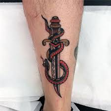 The dagger and snake tattoo is a universal sign of medicine and healing, but nowadays it can be interpreted as a mark of renewal and transformation. 50 Snake Dagger Tattoo Ideas For Men Sharp Serpent Designs