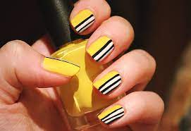 Many nails designs for yellow nail polish. Yellow Nails With Black And White Stripes Design Nail Art
