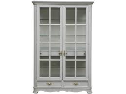 Armida old style display cabinet made of wood or lacquer with two doors, glass shelves, and back either mirrored or matching the structure. Pulaski Furniture Dining Room China Cabinet P043304 Finesse Furniture Interiors Edmonton