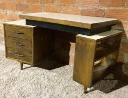 It can even double as extra seating as needed. Mid Century Modern Wooden Desk With Floating Curved Top Modern Wooden Desk Wooden Desk Home Decor