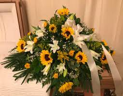 Aurora flowers aurora flower delivery, roses, tulips, gerbera daisies, sunflowers, tulips & more! Sunflowers And Sunshine Casket Spray In Morris Il Classic Floral Design
