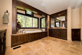 The existing fixtures were removed and replaced with an old world, furniture style cabinet in a dark wood. Tuscan Style Master Bathroom Traditional Bathroom Seattle By Wren Willow Inc Houzz