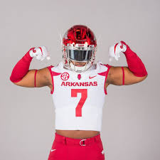 Some sources record that in the 1920s, a group of farmers began calling to the razorbacks football team in the same manner they would call their pigs home. Rising Lb Andrew Parker Sticks With Arkansas Over Texas Burnt Orange Nation