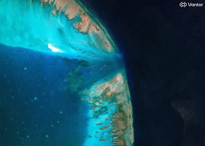 EXCLUSIVE: China moves to block entrance to disputed South China Sea shoal,  images show | Reuters