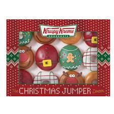 Download vector christmas wreath, pine leaves, red christmas balls, green ribbon, arrows and wheat with merry christmas on the center and stars on a dark blue background wallpaper for your desktop, mobile phone and table. You Can Get Christmas Krispy Kreme Donuts To Your Doorstep Wales Online