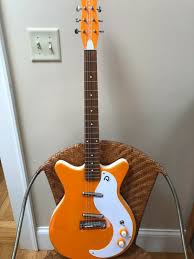 Danelectro 59m Nos Plus Electric Guitar Orange Electric Guitar Guitar Cool Electric Guitars