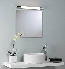 Perfect for minimalist, modern, and even industrial bathroom designs, this vanity light makes a bold first impression long gold finish bath vanity light: Modern Bathroom And Vanity Lighting Solutions