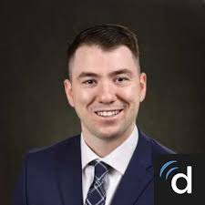 Dr. Christopher Husson, MD