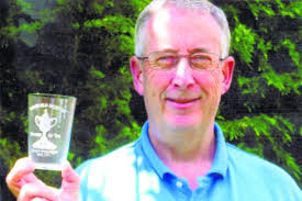 David raising a glass to Ton