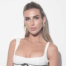 Tommy Paul's influencer girlfriend Paige Lorenze stuns in sporty mini dress 