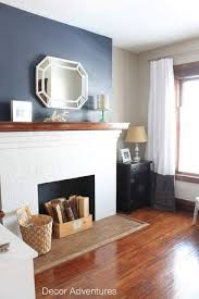 Painting A Hale Navy Accent Wall Above The Fireplace In Our Old House Foyer Feature Wall Living Room Accent Walls In Living Room Living Room White