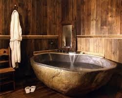 These stone bathtubs are a beautiful composition of earth's elements. 25 Beautiful Example Of Stone Bathtub