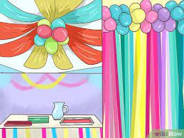 If the guest of honor is a fan, drape tables with deep purple velvet with touches of raspberry and design centerpieces with accents of diamonds and pearls. 3 Ways To Have A Surprise Party For Your Mom Wikihow