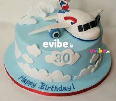 I found wilton's fondant trimmer quite handy for making the waves. Order Beautiful Sky High Plane Cake Online Birthday Cake In Bangalore Free Home Delivery Evibe In
