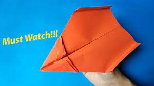 Fold the long side farthest away from you down about an inch. How To Make A Best Paper Airplane Glider Step By Step Easy Paper Airplanes That Fly Far 10000 Feet Youtube