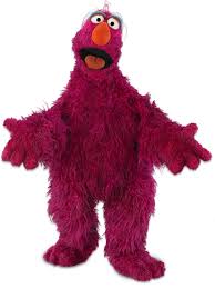 Telly monster is a worrying reddish purple monster from sesame street. Telly Monster