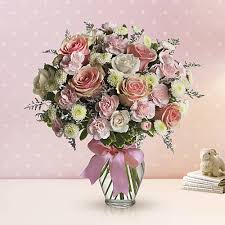 Each of these gifts use the candy bars to create a vase, for a stylish gift basket. Cotton Candy Bouquet Teleflora