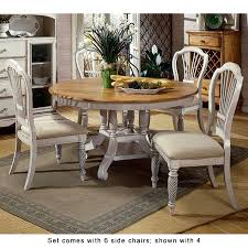 It features a nocturn black and coventry grey finish that highlights its strong contemporary profiles and is accented with both clear glass and black glass. Hillsdale Furniture Wilshire Antique White Dining Set Bac Ojj