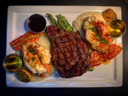 Rib eye steak lobster tail and asparagas. The Best Steakhouses In Las Vegas Eater Vegas