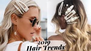 Loosely curl your hair and then clip one side back with a pretty barrette made of flowers. How To Rock Pearl Hair Clip Trend Hotttest Hairstyles Youtube