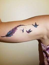 34 Stunning Feather Tattoo Ideas Fashionmoe Feather Tattoos Feather With Birds Tattoo Tattoos