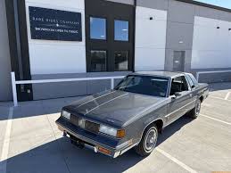 Image result for Light Driftwood 1987 Oldsmobile