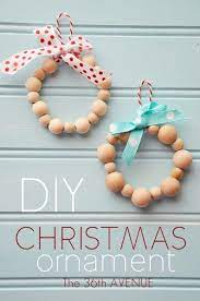 Diy Wood Bead Ornaments Homemade Christmas Decorations Wood Christmas Ornaments Diy Christmas Ornaments