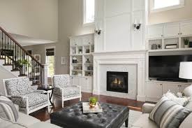 Below are 7 top images from 18 best pictures collection of two story living room decorating ideas photo in high resolution. Two Story Woodbury Living Room Fireplace Design Ispiri Projects