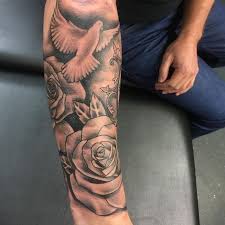 Forearm Bird And Rose Tattoo Flying Bird And Roses Forearm Tattoo Shoulder Tattoos For Men Black Leather Sofa Black Shirt An Tattoos For Guys Mens Shoulder Tattoo Back Tattoos For Guys