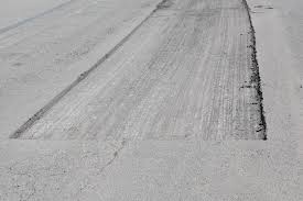 Recycling an existing asphalt surface. Guide To Resurfacing Asphalt Driveways Parking Lots