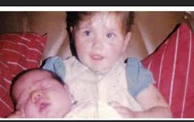 Could anyone kindly fix these photos of me and my sister it's her birthday  coming up and I have no other childhood photos The second one was taken off  a camcorder so