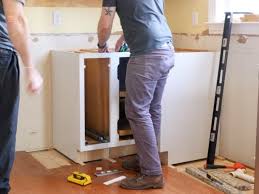Building ikea kitchen cabinets installing the butcher block 2. How To Install Kitchen Cabinets And Remove Them Kitchen Remodel Pt 1 Crafted Workshop