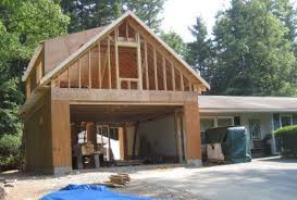 Expand Your Living Space With An Above Garage Addition Looking To Add Room Above Your Garage Where You Re Garage Bedroom Room Above Garage Garage Addition