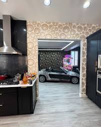 It's spring here in Vegas, so time to rotate cars. Taking the Speedster  replica out of the dining room, putting the Honda Beat inside for a few  months.