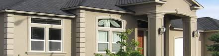 Most stucco comes in natural tones and in vertical panels. Stucco