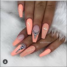 So, here we are showing you how extremely well it collaborates with both short and longs nails. Coffin Neon Peach Nails Novocom Top