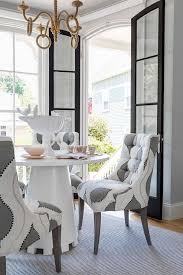 Dining table, white dining chairs, metal dining chairs, dining seat covers, chair bottoms, dining seat cushions, yellow chair covers, black wood dining chairs. Round White Dining Table With White And Gray Tufted Chairs Transitional Dining Room