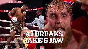 Anthony Joshua knocks out Jake Paul in farcical Netflix boxing showdown...  after YouTuber dived to the floor throughout bloody onslaught