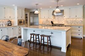A super job on our kitchen cabinet repair. Ivory Kitchen Cabinets Transitional Kitchen Elissa Grayer Design