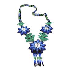 Maybe you would like to learn more about one of these? Huichol Beaded Flowers Hand Made Seed Bead Necklace Momentum Vintage
