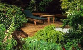 Designing Small Gardens The Delights Of Decking Small North Facing Garden Ideas Small Gardens Small Garden Design