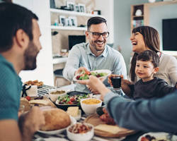 happy family enjoying a mealの画像